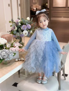 Есенно-зимния нова рокля на принцеса от окото на материал за момичета 2023 година